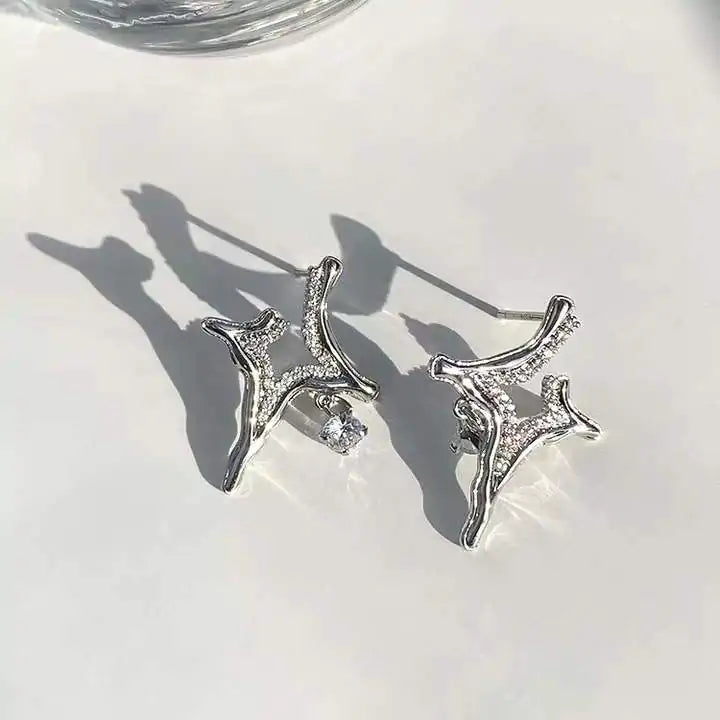 Boucles d'oreilles en strass astérisme