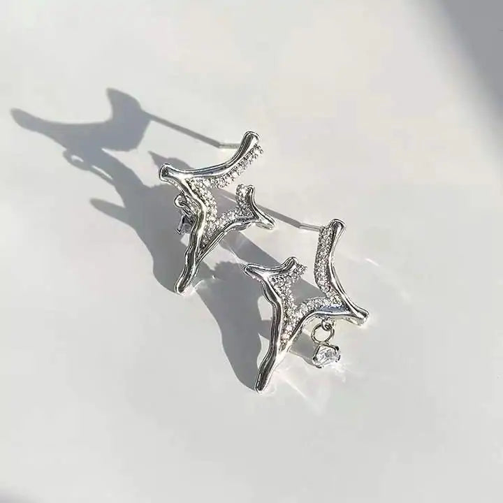 Boucles d'oreilles en strass astérisme